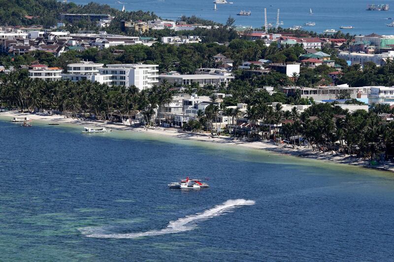 A lone jetski manoeuvres along the waters at the country's most famous beach resort island of Boracay. Aaron Favila / AP Photo