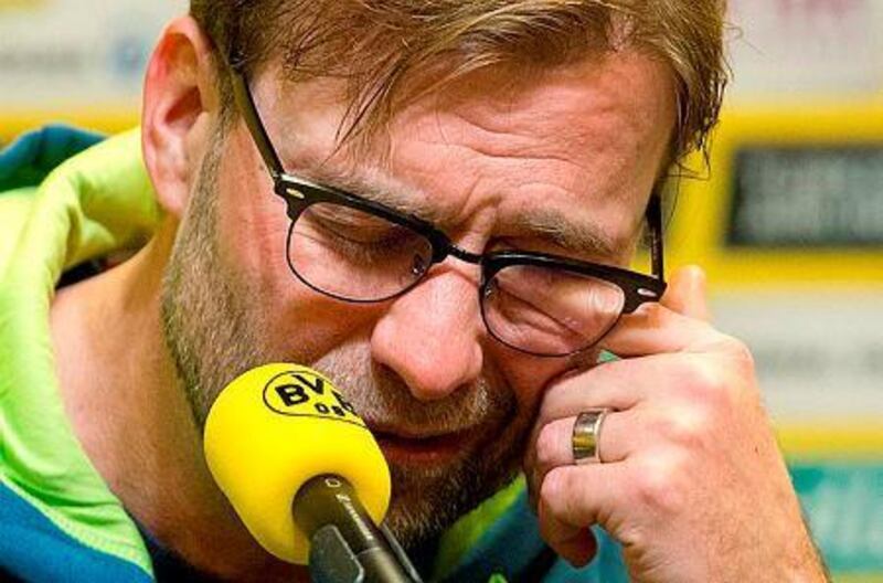 Borussia Dortmund coach Jurgen Klopp insists they are not relegation candidates, despite their league position. AFP PHOTO