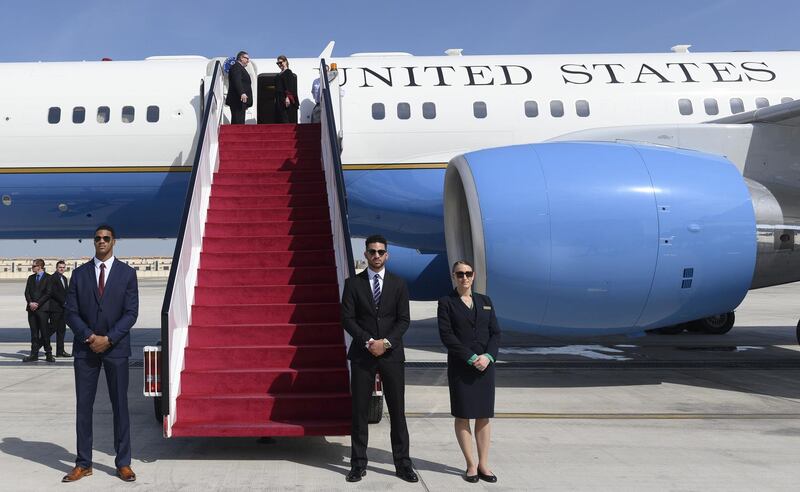 Mike Pompeo and his wife Susan depart from Abu Dhabi International Airport. AFP