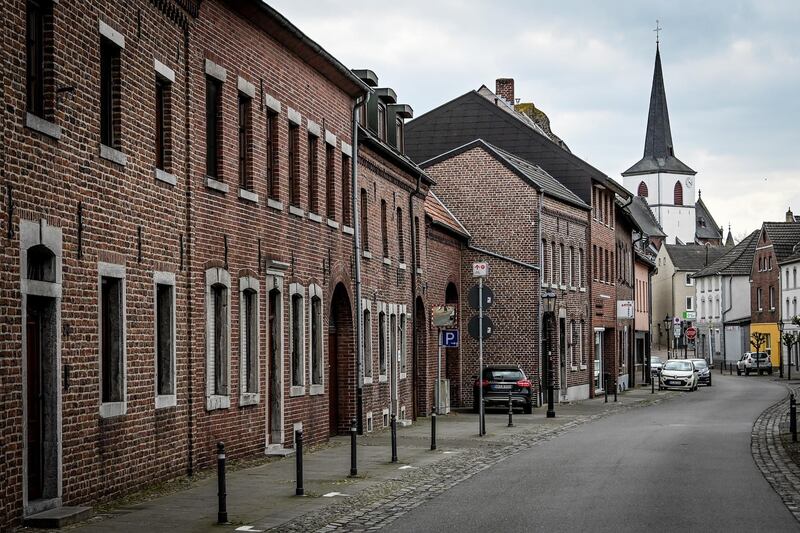 epa08341620 A lonesome street in Gangelt of the Heinsberg district, Germany, 03 April 2020. Heinsberg was the first epicenter of the corona pandemic of the COVID-19 disease caused by the SARS-CoV-2 coronavirus in Germany. According to the disease control center of the Robert Koch Institute, the number of coronavirus COVID-19 cases in Germany has exceeded the 87,000 mark on Friday evening 03 April 2020.  EPA/SASCHA STEINBACH