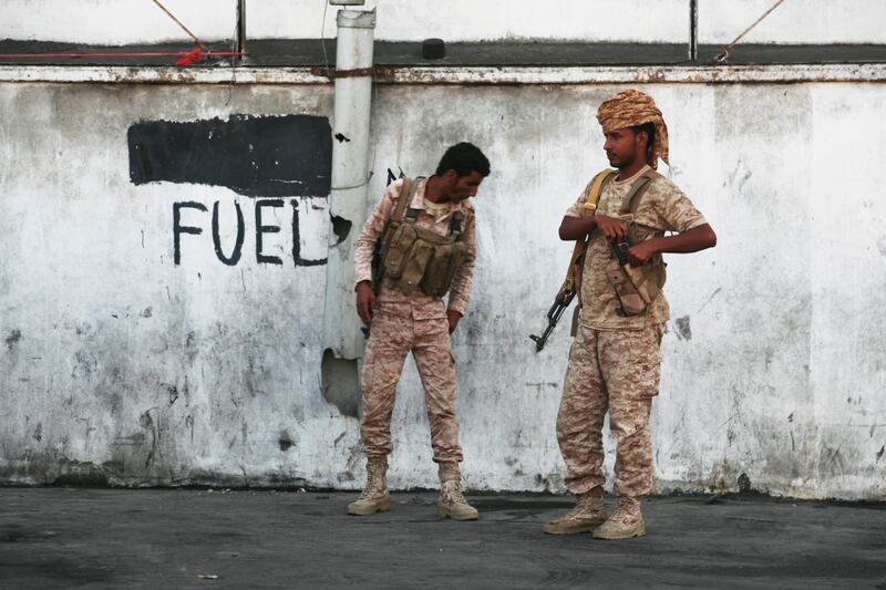 Soldiers stand guard in Mukalla. AP Photo