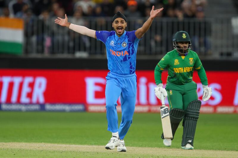 India's Arshdeep Singh, left, appeals successfully for the dismissal of South Africa's Rilee Rossouw. AP 