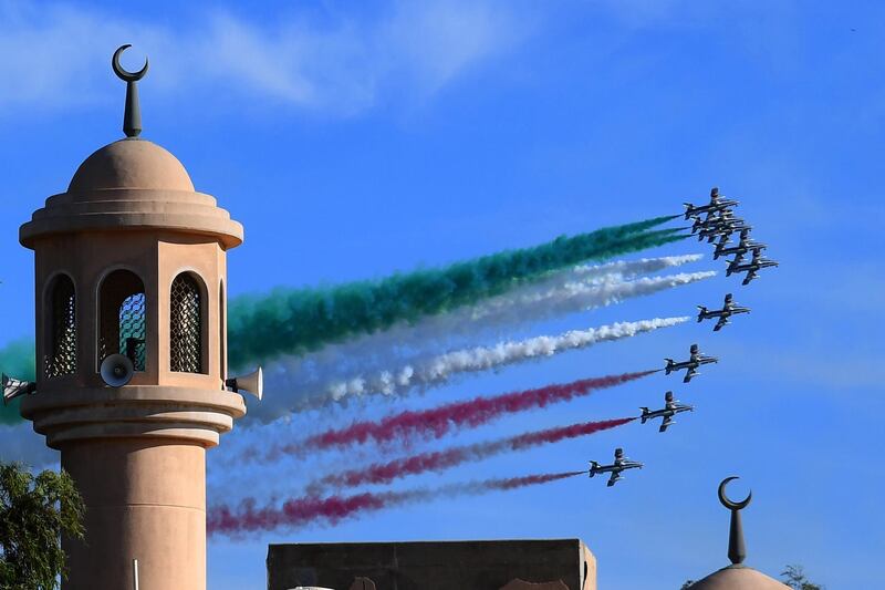The Italian Air Force's aerobatic team performs in Kuwait City, Kuwait. AFP