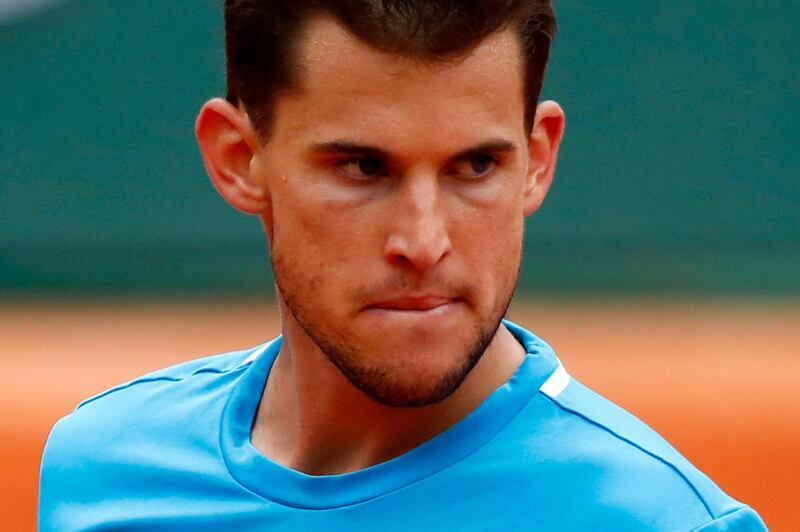 Thiem reacts as he plays Nadal. AP Photo