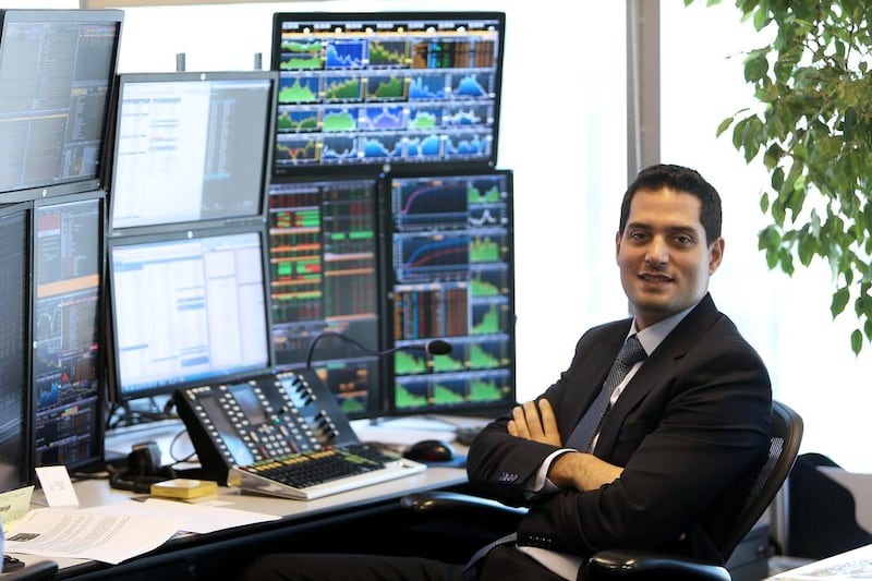 Adel Merheb, of Shuaa Capital at his office in Emirates Towers in Dubai. Pawan Singh / The National
