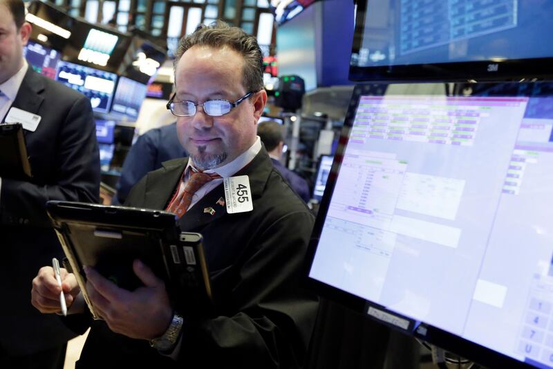 Trader Robert Arciero works on the floor of the New York Stock Exchange, Friday, Feb. 9, 2018. Wall Street capped a day of wild swings Friday with a late-afternoon rally that reversed steep early losses and sent the Dow Jones industrial average 330 points higher. Even with the rebound, this was the worst week for the market in about two years. (AP Photo/Richard Drew)