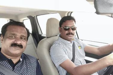 Jamaludeen Arakkaveettil, left, took this photo before boarding the bus from Muscat to Dubai. He died in the crash a few hours later and was the first victim to be repatriated to India.