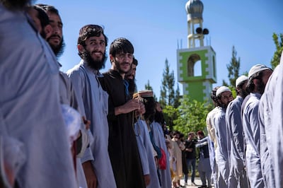 Taliban prisoners wait for their release at a government prison north of Kabul. 900 prisoners were released throughout Afghanistan on Tuesday, the last day of the Islamic festival of Eid-alFirt and the last day of the three-day ceasefire. Stefanie Glinski for The National