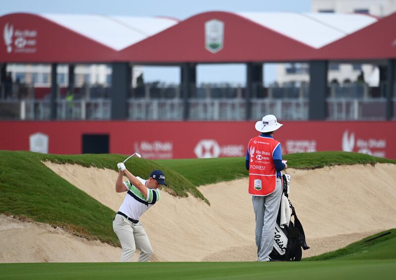 Grant Forrest of Scotland plays a bunker shot on the eighteenth hole during the Pro-Am prior to the Abu Dhabi HSBC Championship at Yas Links Golf Course. Getty