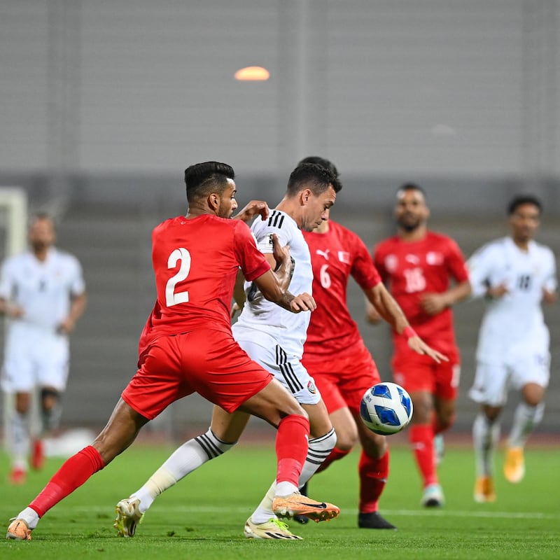 Bahrain's Amine Benaddi tries to stop a UAE attack. Photo: UAE FA