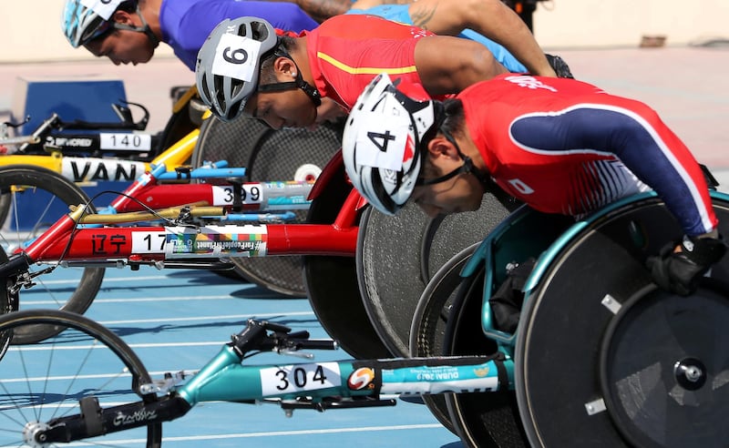 DUBAI, UNITED ARAB EMIRATES , Nov 7  – 2019 :- Athletes participating in the men’s 100m T54 round 1 heat 1 during the Dubai 2019 World Para Athletics Championship held at Dubai Club For People Of Determination in Dubai. ( Pawan Singh / The National )  For New. Story by Ramola