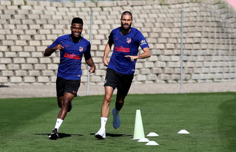 Thomas Lemar (L) and Yannick Carrasco during a training session at Wanda Sport City. EPA