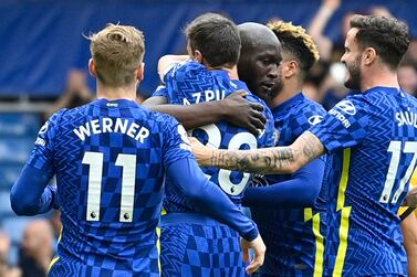 Chelsea's Belgian striker Romelu Lukaku (C) celebrates scoring the team's first goal during the English Premier League football match between Chelsea and Wolverhampton Wanderers at Stamford Bridge in London on May 7, 2022.  (Photo by JUSTIN TALLIS / AFP) / RESTRICTED TO EDITORIAL USE.  No use with unauthorized audio, video, data, fixture lists, club/league logos or 'live' services.  Online in-match use limited to 120 images.  An additional 40 images may be used in extra time.  No video emulation.  Social media in-match use limited to 120 images.  An additional 40 images may be used in extra time.  No use in betting publications, games or single club/league/player publications.   /  