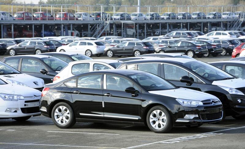 (FILES) In this file photo taken on February 17, 2011 Cars are parked at the carmaker PSA Peugeot-Citroen automobile factory taken in Rennes. AFP PHOTO DAMIEN MEYER
French auto maker PSA will announce the group's 2017 annual results on March 1, 2018. / AFP PHOTO / DAMIEN MEYER