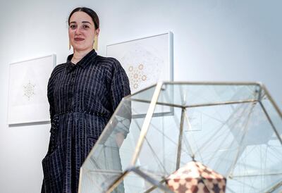 Abu Dhabi, United Arab Emirates, February 15, 2020.  
    STORY BRIEF: Opening of UAEUnlimited exhibition Intimaa: Belonging at the  NYUAD Art Centre.
  --Dana Awartani, Icosahedron within a Dodecahedron II from The Platonic Solid Duals Series, 2018.  wood, brass, glass.
Victor Besa / The National
Section:  AC
Reporter:  AlexandraChaves