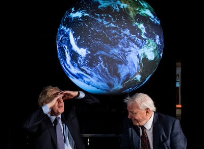 Britain's then Prime Minister Boris Johnson, left, and Sir David Attenborough attend the launch of the UK-hosted Cop26 UN Climate Summit in 2001. AP