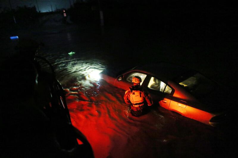 A rescue team from the local emergency management agency inspects flooded areas after the passing of Hurricane Irma on September 6, 2017 in Fajardo, Puerto Rico. Jose Jimenez / Getty Images