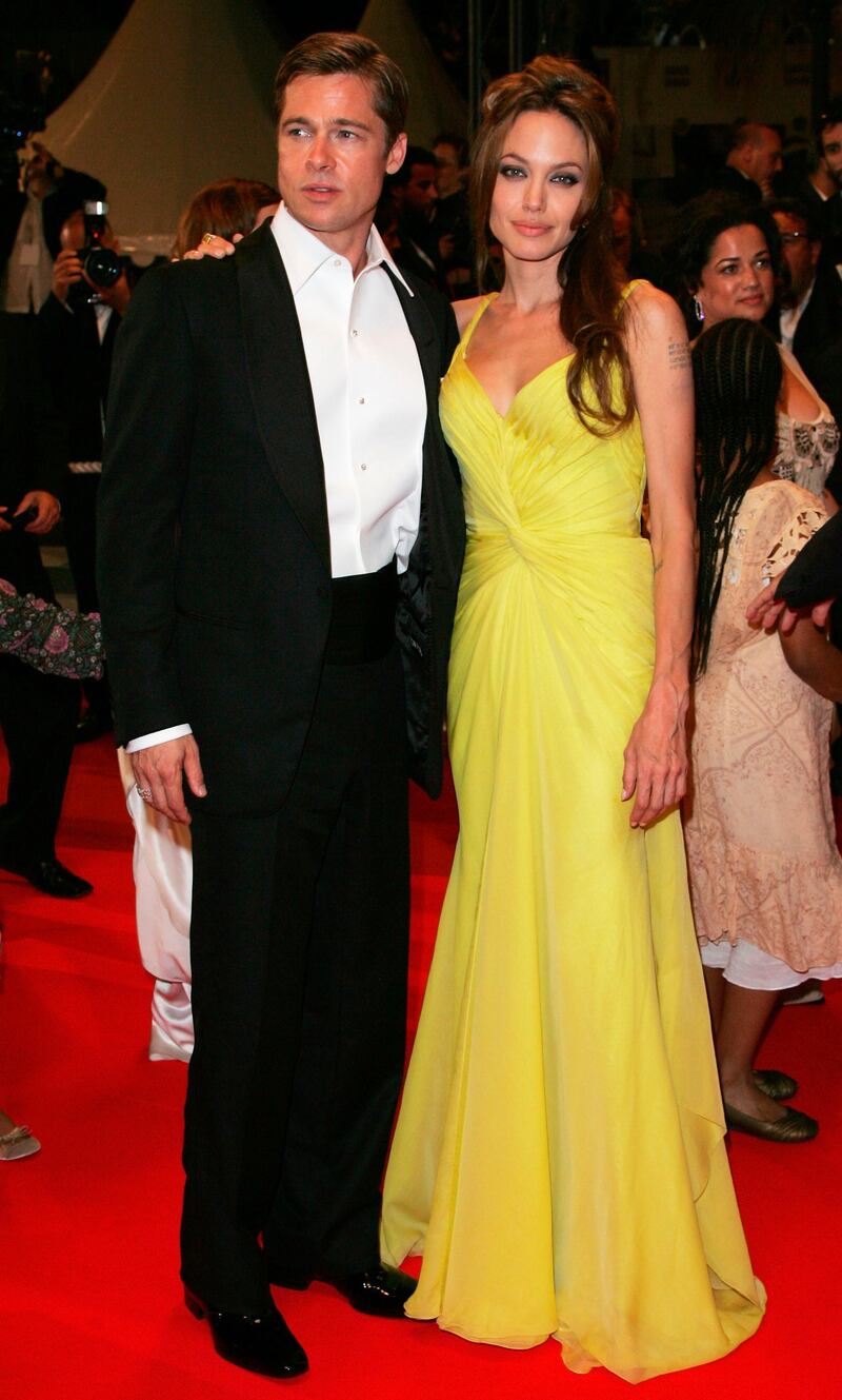 CANNES, FRANCE - MAY 24:  Actors Brad Pitt and Angelina Jolie depart the premiere for the film 'Ocean's Thirteen' at the Palais des Festivals during the 60th International Cannes Film Festival on May 24, 2007 in Cannes, France.  (Photo by Gareth Cattermole/Getty Images)