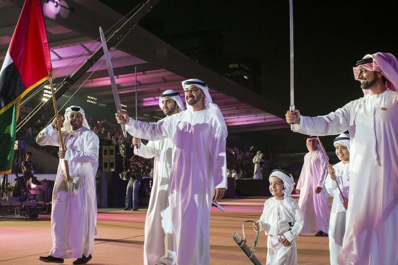 The Crown Prince of Abu Dhabi, dancing during the UAE’s 42nd National Day celebrations at the Abu Dhabi National Exhibition Centre. Ryan Carter / Crown Prince Court — Abu Dhabi