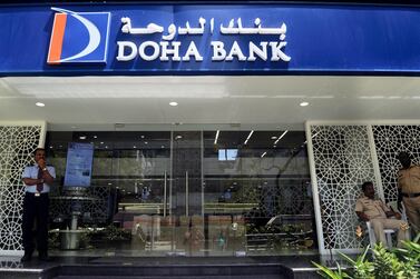 A group of refugees have accused Doha Bank, the largest private commercial bank in the state of Qatar, of allowing two individuals to use their accounts to fund a terror group. AFP PHOTO/ Indranil MUKHERJEE 