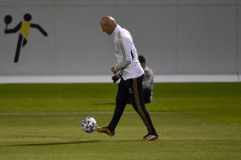 Zinedine Zidane kicks a ball during Real Madrid's training session. AFP