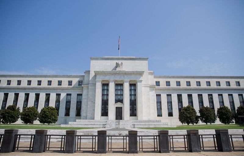 FILE - This Wednesday, Aug. 2, 2017, file photo shows the Federal Reserve Building on Constitution Avenue in Washington. The Federal Reserve is likely to point to strong growth in the economy, low unemployment and rising inflation as reasons to keep on its current path of gradually raising interest rates. The Fed's statement at the end of its two-day meeting will be released Wednesday afternoon, Aug. 1, 2018, in the form of a brief policy statement. (AP Photo/Pablo Martinez Monsivais, File)