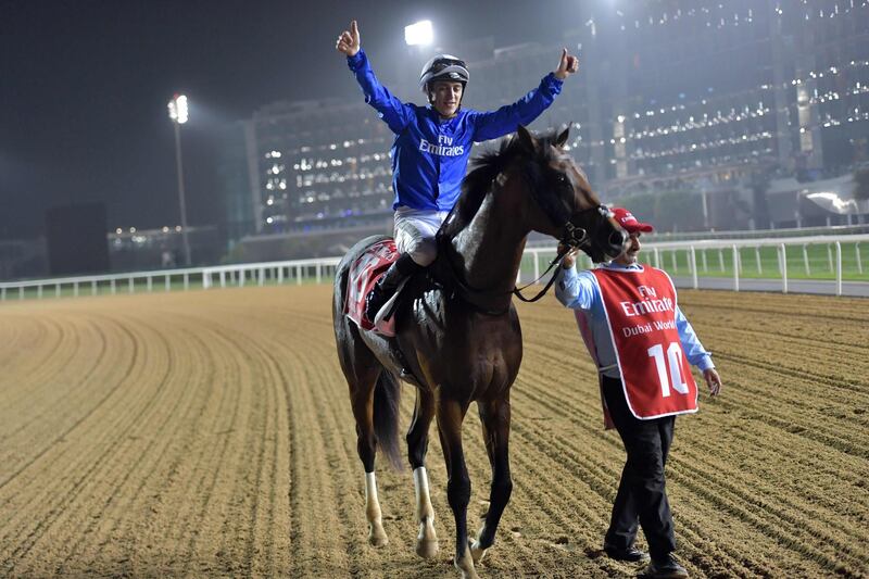 Christophe Soumillon celebrates after riding Thunder Snow to victory in the Dubai World Cup. Giuseppe Cacace / AFP