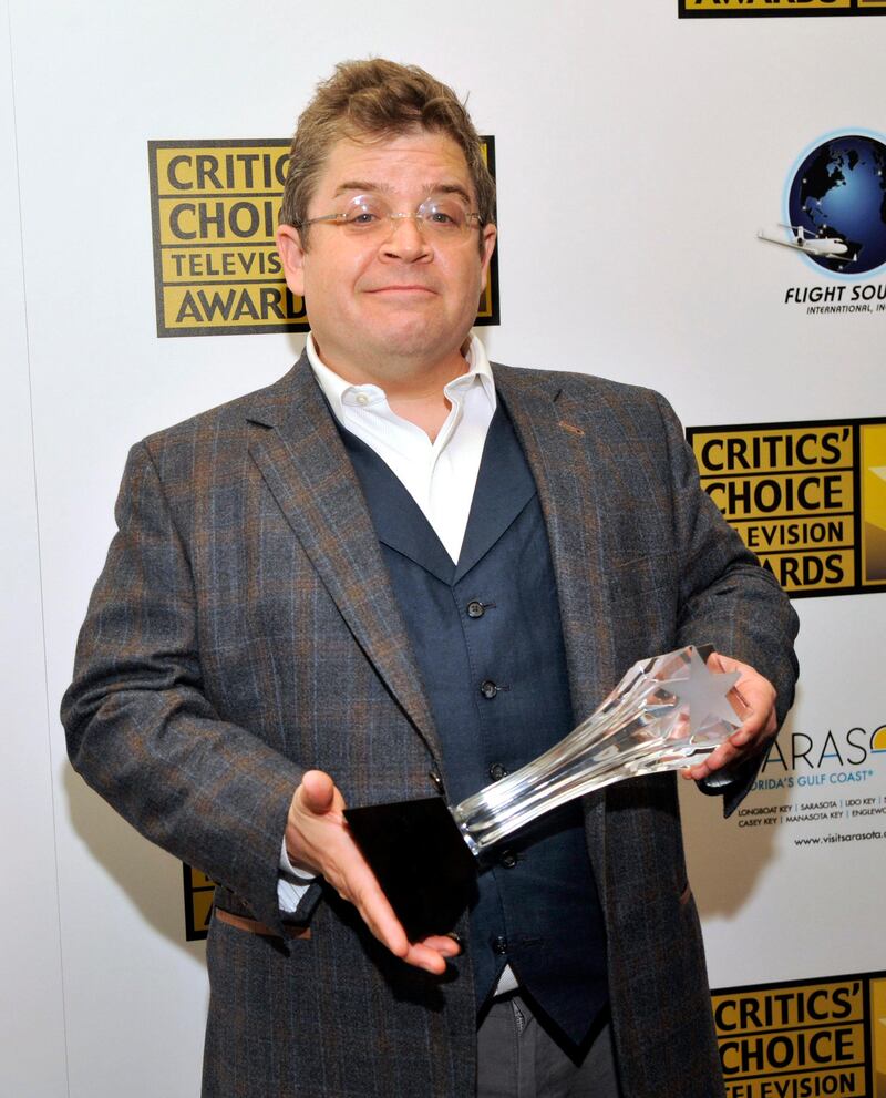 Patton Oswalt poses with his award for best guest performer in a comedy series for "Parks and Recreation" at the Critics' Choice Television Awards in the Beverly Hilton Hotel on Monday, June 10, 2013, in Beverly Hills, Calif. (Photo by Chris Pizzello/Invision/AP) *** Local Caption ***  2013 Critics Choice Television Award - Press Room.JPEG-0d0e0.jpg