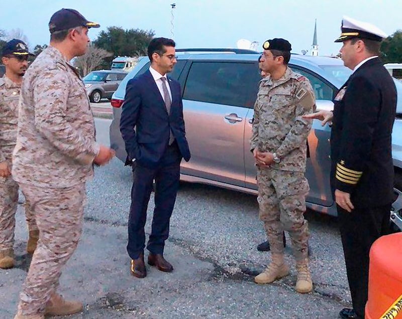 In this made available by the FBI, Saudi Arabia Defense Attaché Major General Fawaz Al Fawaz (second from right) meets with Saudi students at the NAS Pensacola base in Pensacola, Fla.  AP
