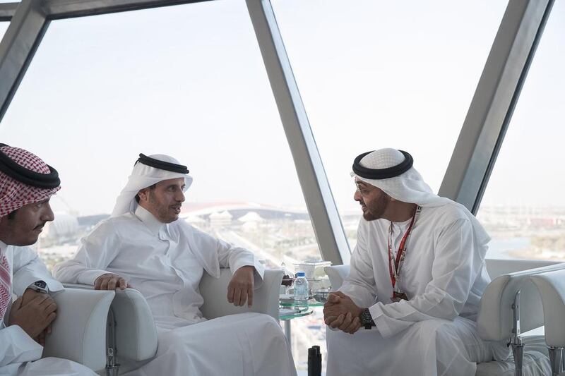 Sheikh Mohammed bin Zayed, Crown Prince of Abu Dhabi and Deputy Supreme Commander of the Armed Forces, with Sheikh Abdullah bin Nasser bin Khalifa Al Thani, Prime Minister of Qatar, centre, at Shams Tower. Ryan Carter / Crown Prince Court - Abu Dhabi