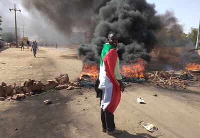 A Sudanese protester in Khartoum's twin city of Umm Durman. AFP