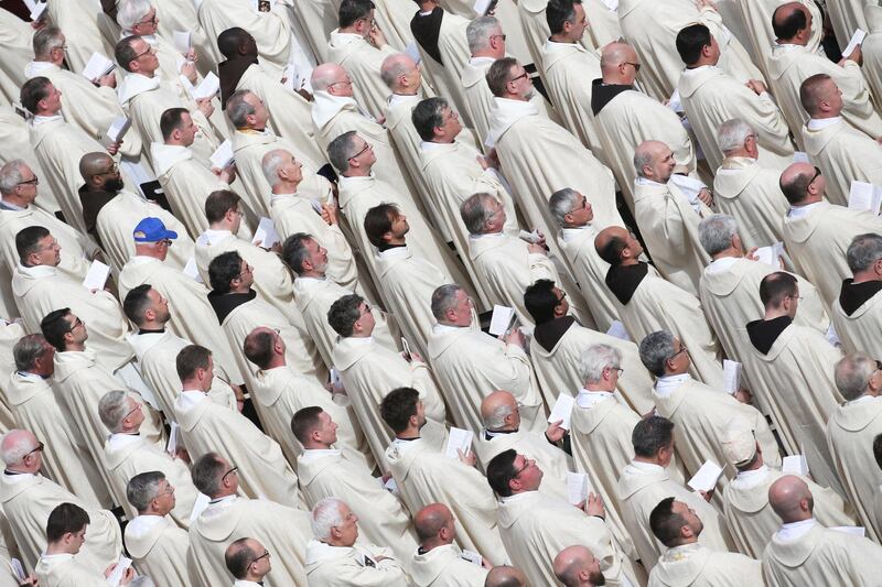 Priests are seen as Pope Francis leads a Holy Mass to mark the feast of Divine Mercy at the Vatican. Alessandro Bianchi / Reuters