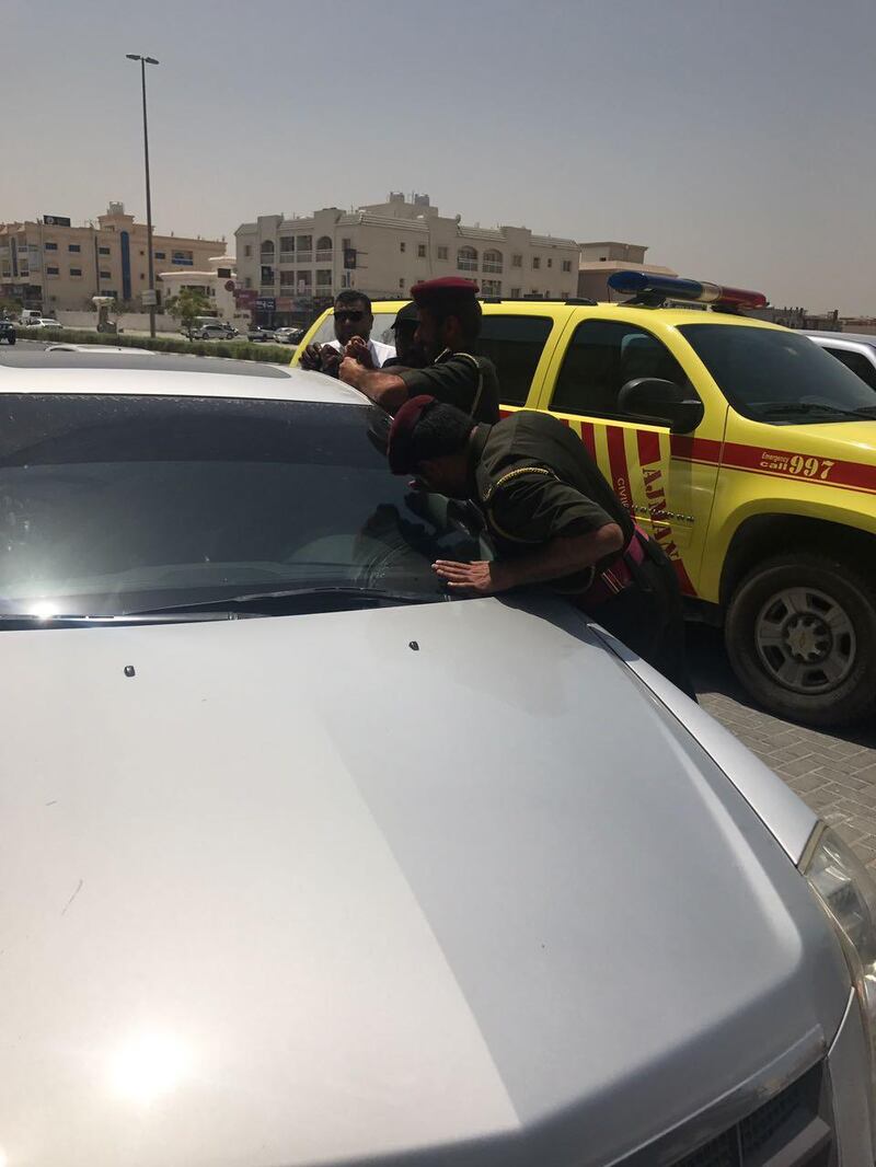 Ajman Civil Defence rescue a 20-month-old boy from a locked car. Ajman Civil Defence