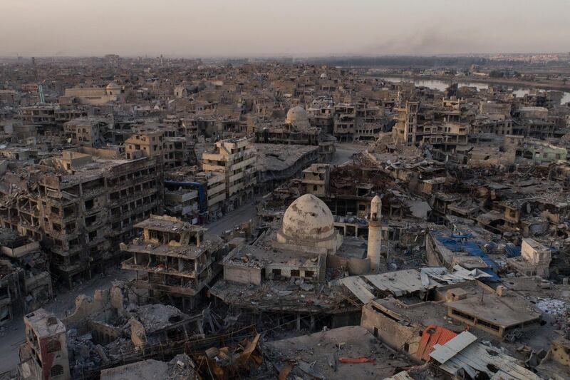 In this Nov. 15, 2017 photo, aerial view of destroyed building and shops in the Old City of Mosul, Iraq. The scope of destruction in the neighborhood is comparable to some of the worst urban battles of World War II, and the cost of rebuilding is nearly incalculable.  (AP Photo/Felipe Dana)