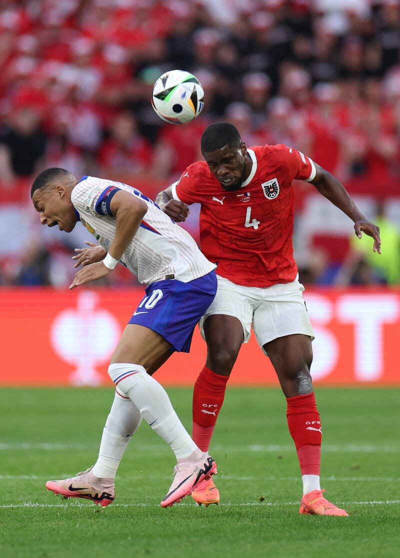 Good clearing header from dangerous Griezmann free kick. Muscular physical presence in the centre of defence. Strong as an ox. Great saving tackle on Kolo Muani. Mbappe's nose came off worst when it picked a fight with his shoulder late in the game. Getty Images