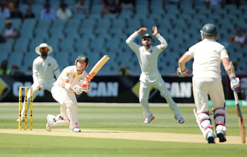 ADELAIDE, AUSTRALIA - DECEMBER 09: David Warner of Australia bats during day one of the First Test match between Australia and India at Adelaide Oval on December 9, 2014 in Adelaide, Australia.  (Photo by Morne de Klerk/Getty Images)