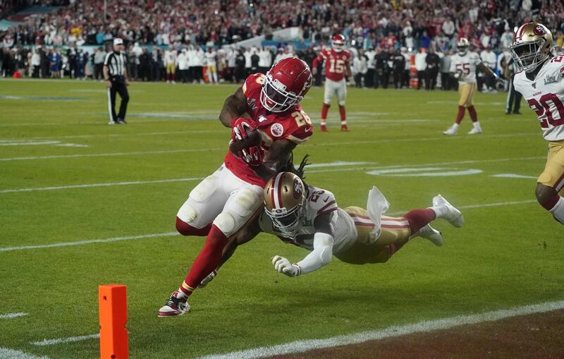 San Francisco 49ers' Richard Sherman fails to stop Chiefs' Damien Williams scoring a touchdown.  AFP