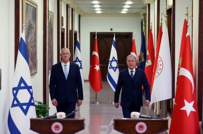 Israeli Defence Minister Benny Gantz with Turkish Defence Minister Hulusi Akar in Ankara last month. Reuters
