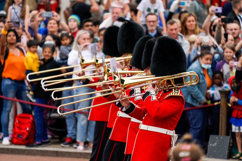 A military band plays tunes saluting British success at the Tokyo Olympics, including the theme from “Chariots of Fire” and Spandau Ballet’s “Gold”. AP Photo