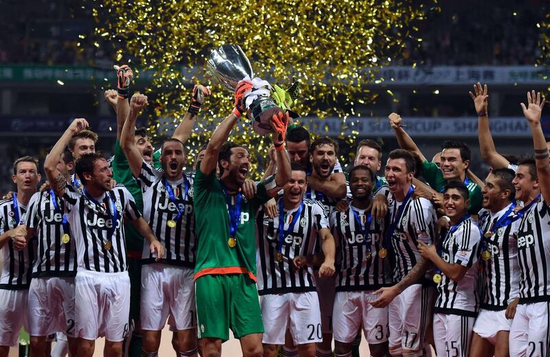 Juventus celebrate winning the 2015 Italian Super Cup. (AFP)