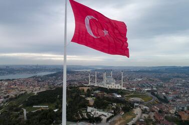 A huge Turkish flag flutters at the Camlica Hill in Istanbul, Turkey. EPA