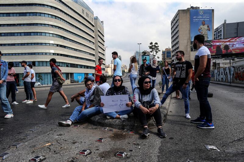 Lebanese protesters block a road during a protest in Beirut.  EPA