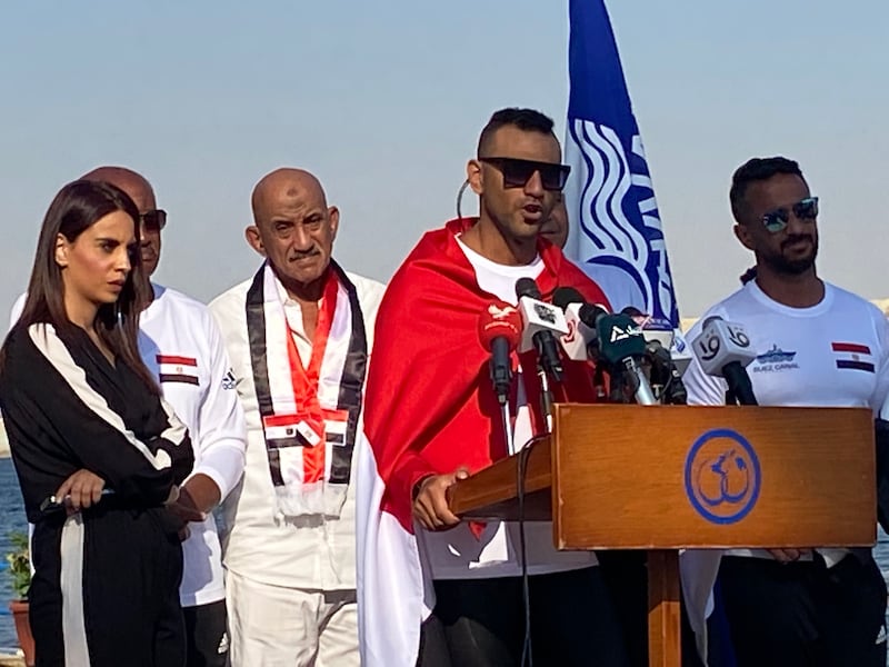 Egyptian monofin swimmer Sayed Baroky reacts after his failed attempt to swim the New Suez Canal with a monofin. Nada El Sawy / The National