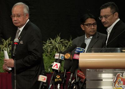 2014年3月24日，时任马来西亚总理纳吉布·拉扎克和时任国防部长希沙姆丁·侯赛因在吉隆坡。法新社