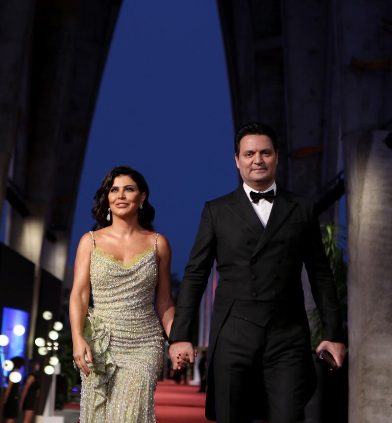 Syrian actress and producer Jumana Murad accompanied by her husband, walk the red carpet at the opening ceremony of the El Gouna Film Festival. AFP
