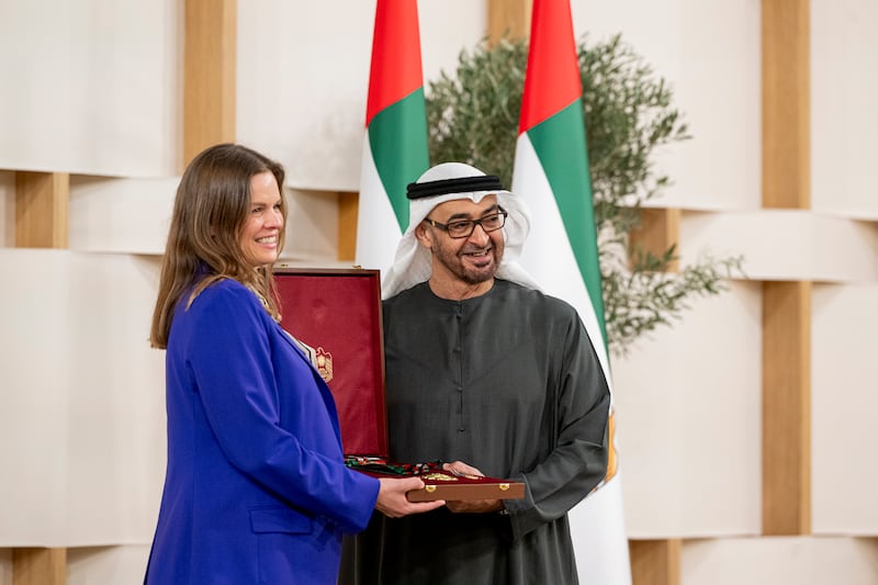 Sheikh Mohamed presents the First Class Order of Zayed II medal to Kate Hampton, chief executive of the Children’s Investment Fund Foundation. Mohamed Al Hammadi / Presidential Court