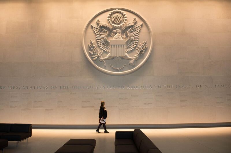 A person walks inside prior to the unveiling of the new US Embassy building in London. Stefan Rousseau - WPA Pool / Getty Images