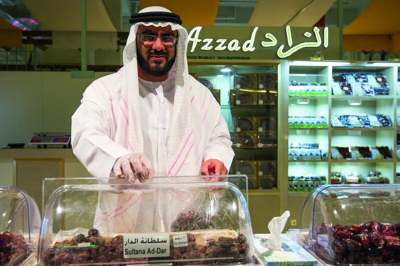 Abdullah Al Baloushi, Emirati date seller and owner of Azzad date shop in the Farmer’s Market at The Market at Mushrif Mall. Mona Al-Marzooqi / The National