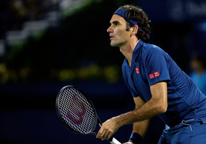 Roger Federer of Switzerland waits for the ball in a match against Borna Coric of Croatia during the Dubai Duty Free Tennis Championship, in Dubai, United Arab Emirates, Friday, March 1, 2019. (AP Photo/Kamran Jebreili)