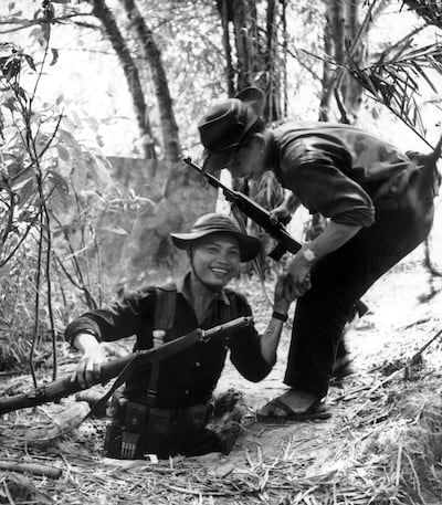 A Vietnamese soldier coming out of one of the tunnels that played such an important role in the Vietnam War. Getty Images